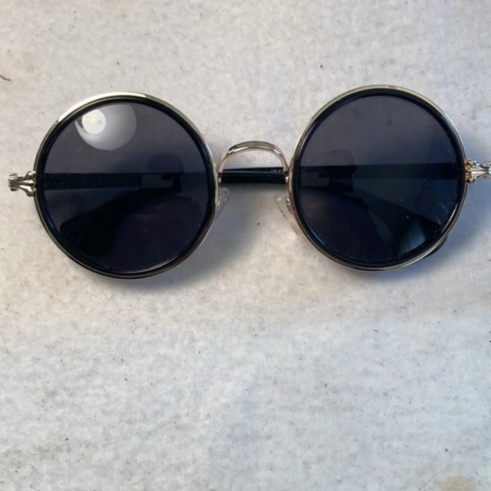 Woman’s Hippie Style Round Gold Toned and Black Frame and Black Lens